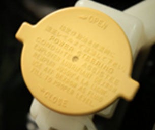 checking fluids power steering fluid | Competition Subaru of Smithtown in St James NY