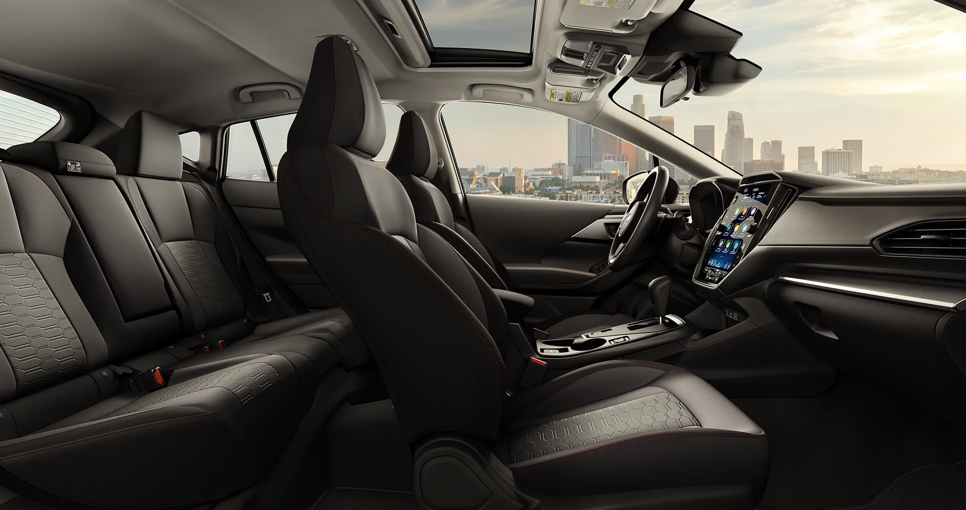 Clean and modern car interior showing front and rear seats, center console, and dashboard